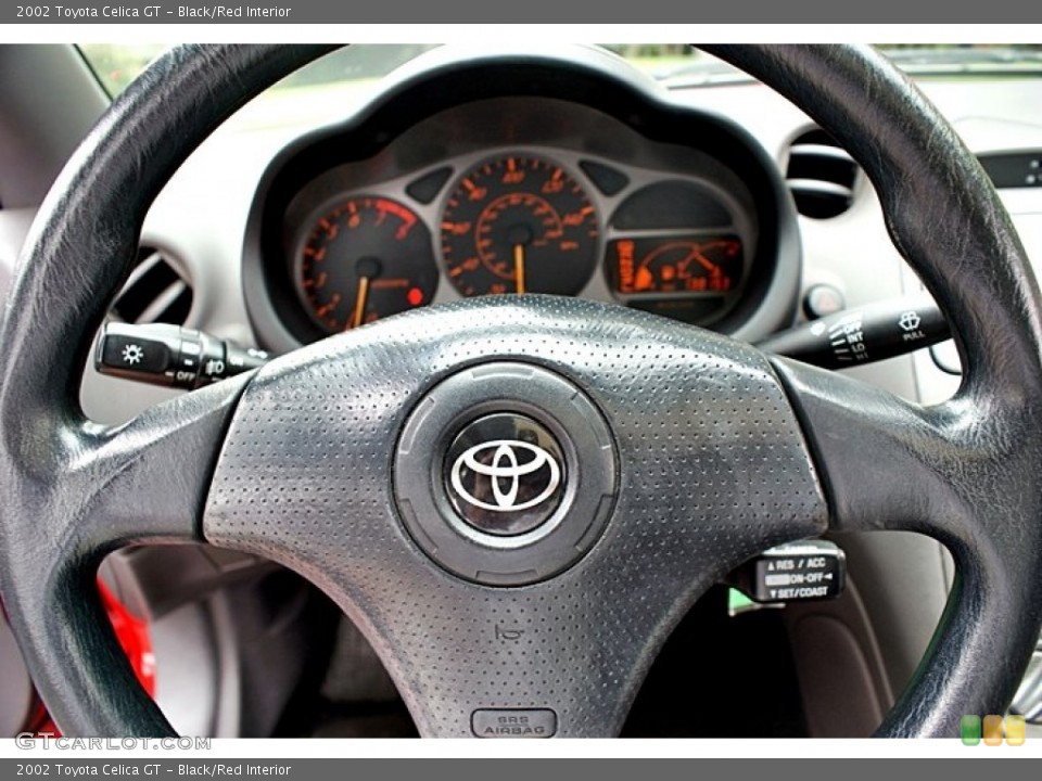 Black/Red Interior Steering Wheel for the 2002 Toyota Celica GT #66138650