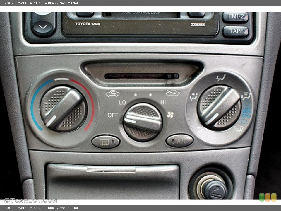 Black/Red Interior Controls for the 2002 Toyota Celica GT #66138725