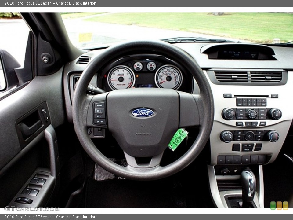 Charcoal Black Interior Steering Wheel for the 2010 Ford Focus SE Sedan #66152054