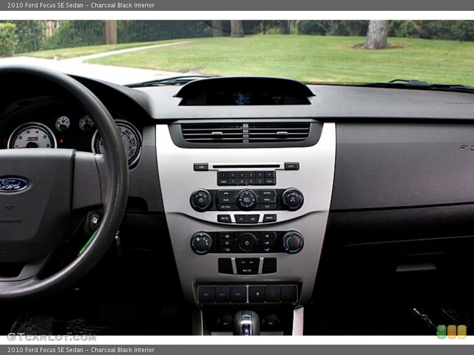 Charcoal Black Interior Controls for the 2010 Ford Focus SE Sedan #66152072