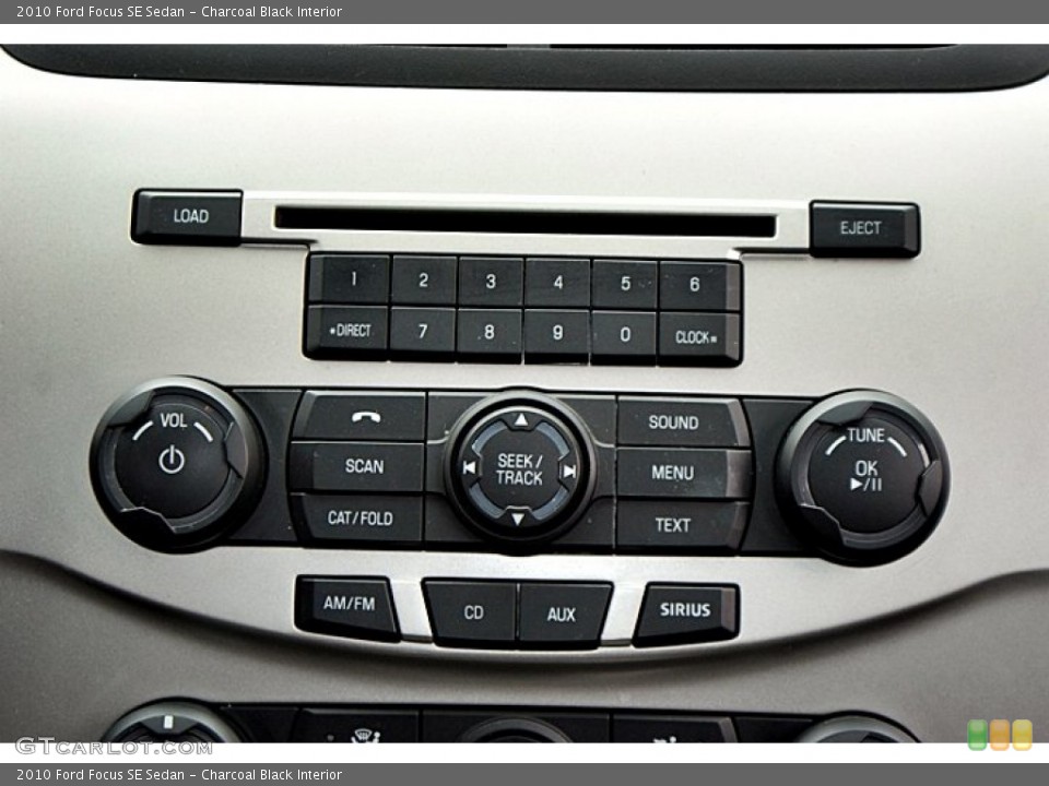 Charcoal Black Interior Controls for the 2010 Ford Focus SE Sedan #66152126