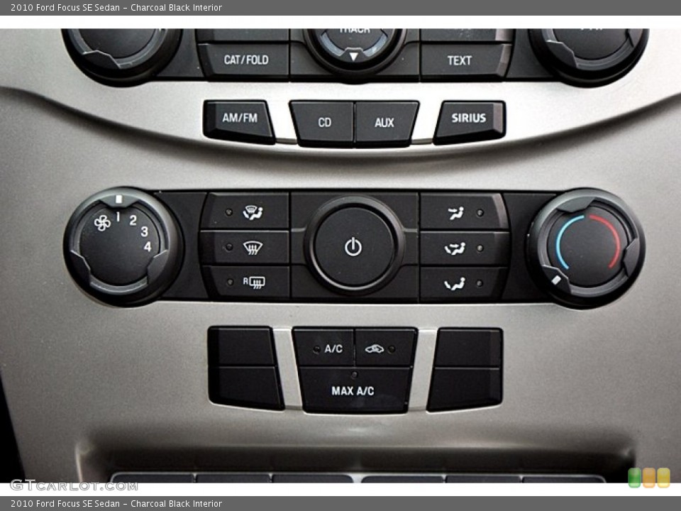 Charcoal Black Interior Controls for the 2010 Ford Focus SE Sedan #66152132