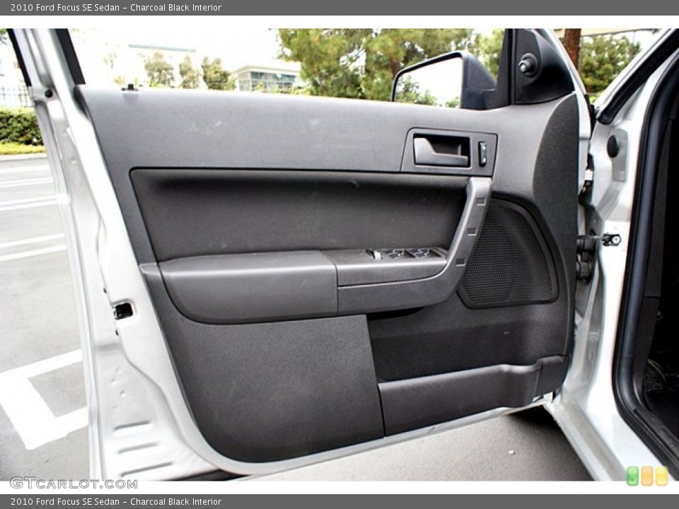 Charcoal Black Interior Door Panel for the 2010 Ford Focus SE Sedan #66152150
