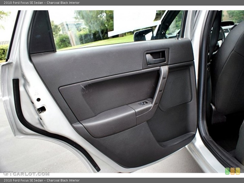 Charcoal Black Interior Door Panel for the 2010 Ford Focus SE Sedan #66152156