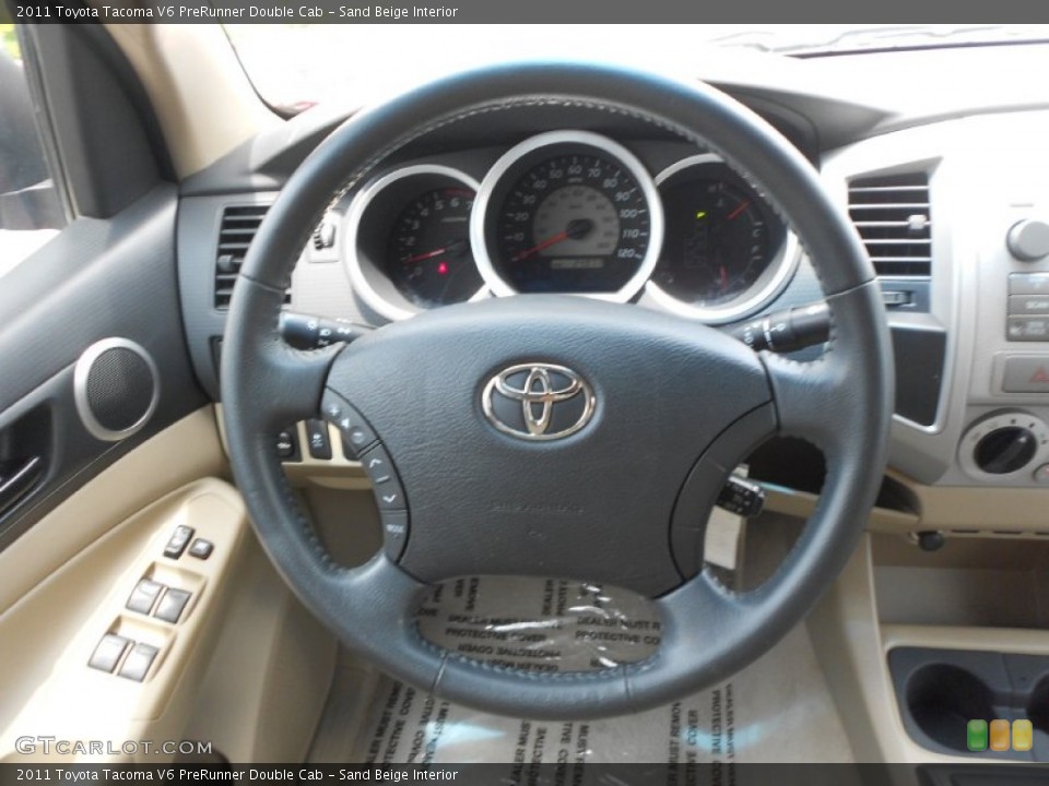 Sand Beige Interior Steering Wheel for the 2011 Toyota Tacoma V6 PreRunner Double Cab #66152162