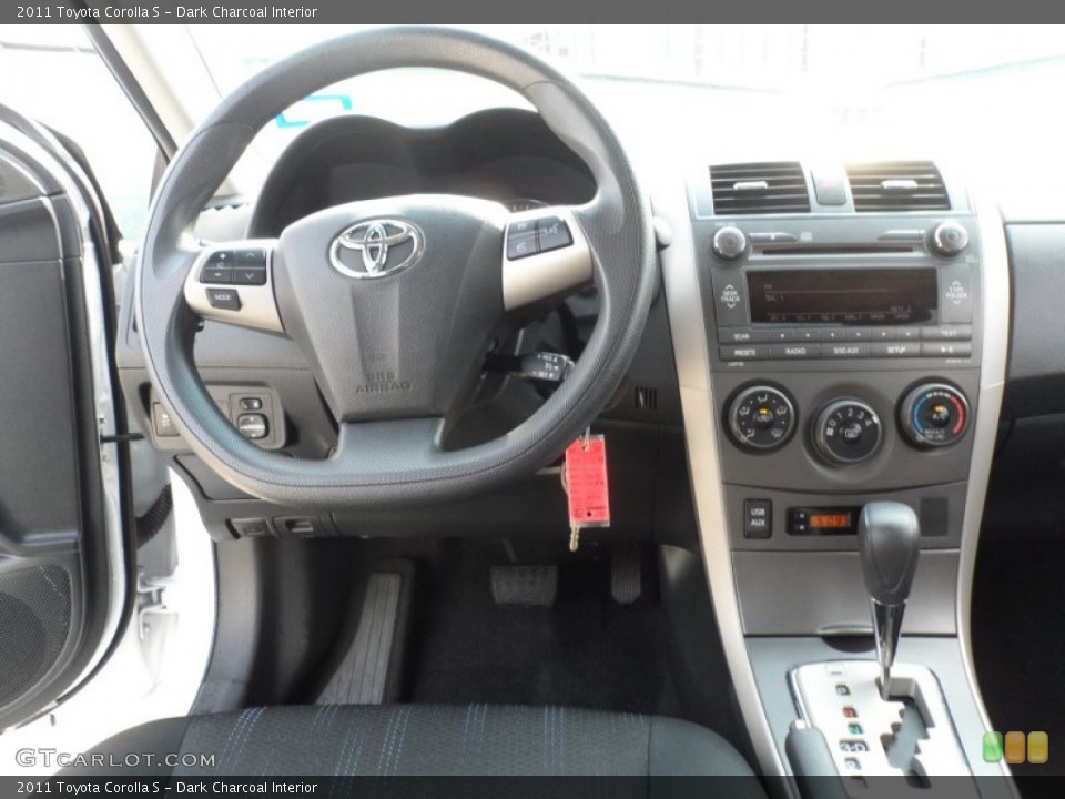 Dark Charcoal Interior Dashboard for the 2011 Toyota Corolla S #66167126