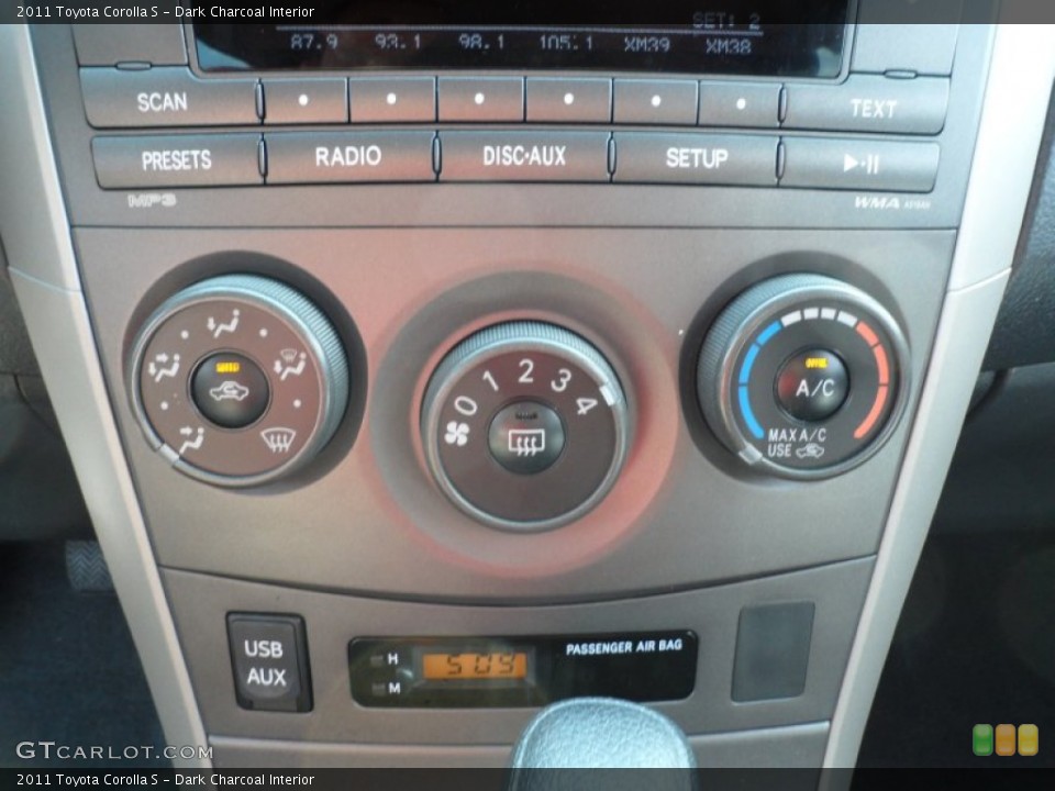 Dark Charcoal Interior Controls for the 2011 Toyota Corolla S #66167144