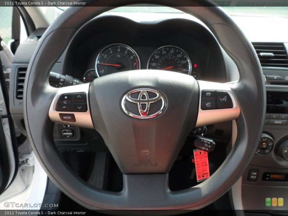 Dark Charcoal Interior Steering Wheel for the 2011 Toyota Corolla S #66167159