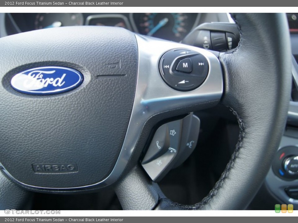 Charcoal Black Leather Interior Controls for the 2012 Ford Focus Titanium Sedan #66199297