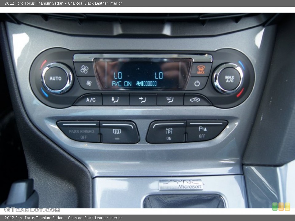 Charcoal Black Leather Interior Controls for the 2012 Ford Focus Titanium Sedan #66199316