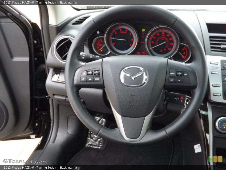Black Interior Steering Wheel for the 2013 Mazda MAZDA6 i Touring Sedan #66222631