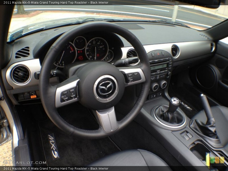 Black Interior Dashboard for the 2011 Mazda MX-5 Miata Grand Touring Hard Top Roadster #66259557
