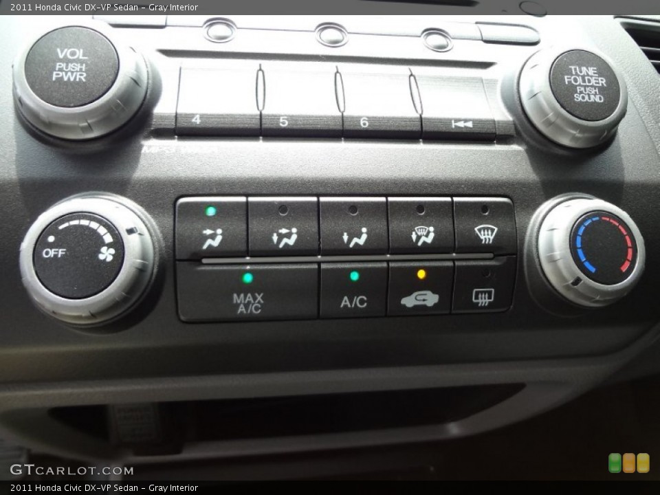 Gray Interior Controls for the 2011 Honda Civic DX-VP Sedan #66266289