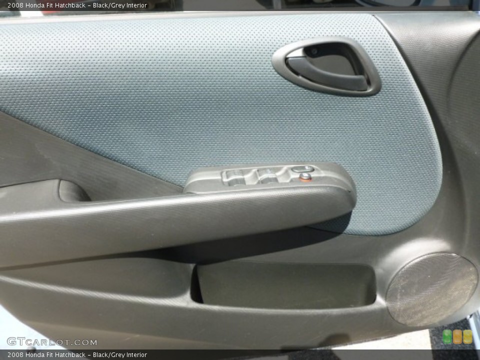 Black/Grey Interior Door Panel for the 2008 Honda Fit Hatchback #66280452
