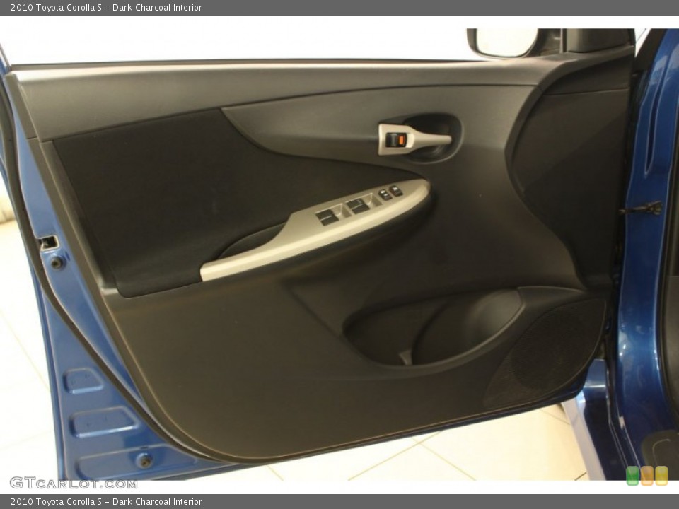 Dark Charcoal Interior Door Panel for the 2010 Toyota Corolla S #66280572