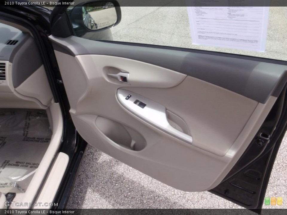 Bisque Interior Door Panel for the 2010 Toyota Corolla LE #66301625