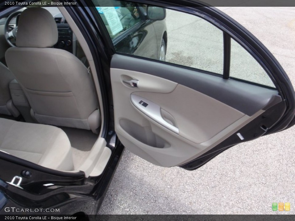 Bisque Interior Door Panel for the 2010 Toyota Corolla LE #66301643