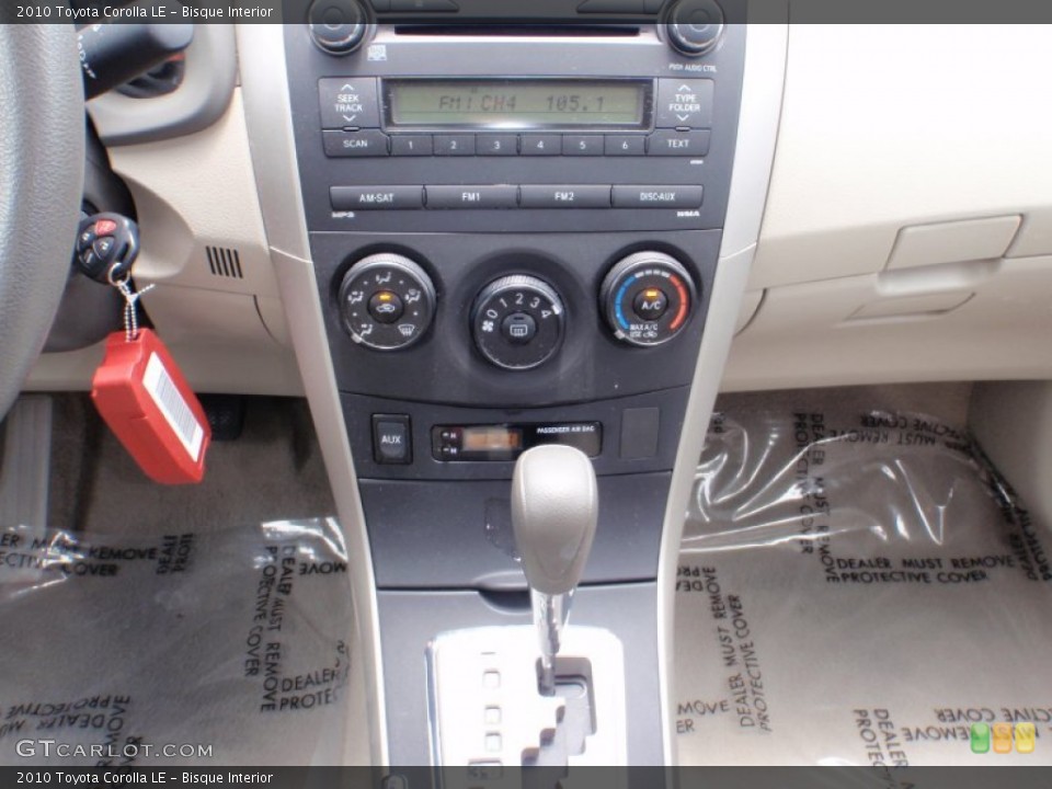 Bisque Interior Controls for the 2010 Toyota Corolla LE #66301679