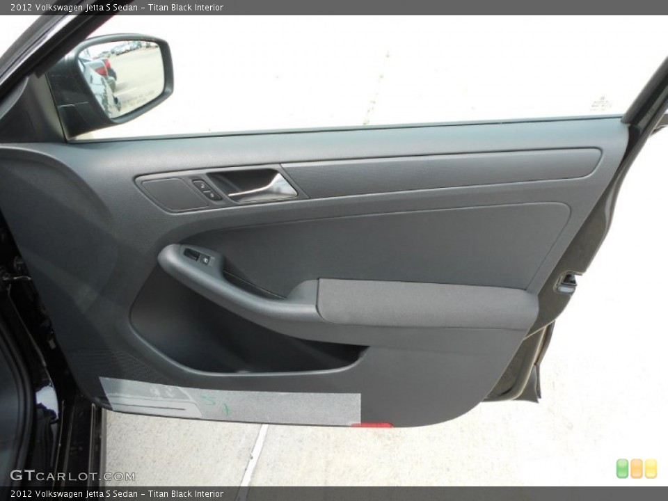 Titan Black Interior Door Panel for the 2012 Volkswagen Jetta S Sedan #66313388