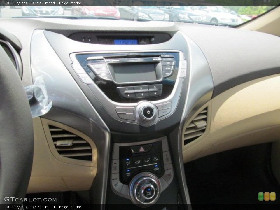 Beige Interior Controls for the 2013 Hyundai Elantra Limited #66329886