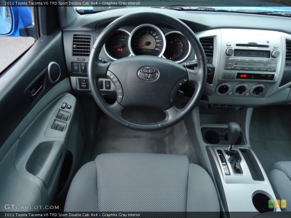 Graphite Gray Interior Dashboard for the 2011 Toyota Tacoma V6 TRD Sport Double Cab 4x4 #66339575