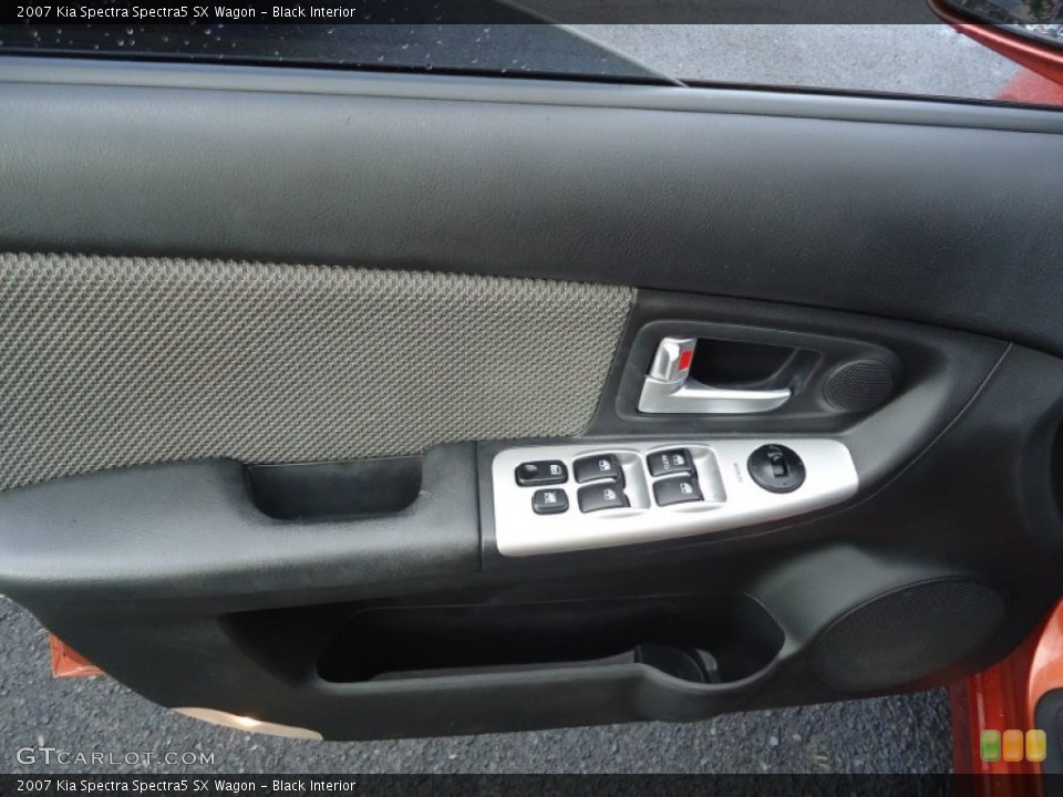 Black Interior Door Panel for the 2007 Kia Spectra Spectra5 SX Wagon #66340706