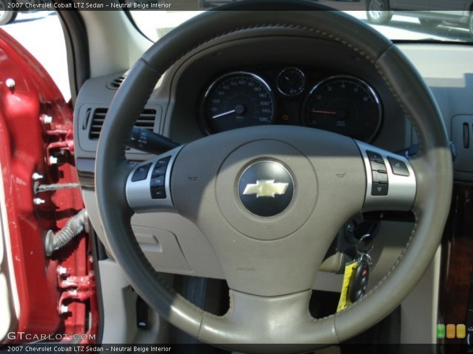 Neutral Beige Interior Steering Wheel for the 2007 Chevrolet Cobalt LTZ Sedan #66348176