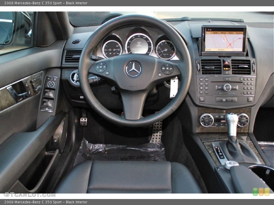Black Interior Dashboard for the 2009 Mercedes-Benz C 350 Sport #66384032