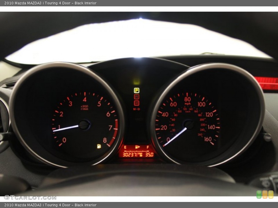 Black Interior Gauges for the 2010 Mazda MAZDA3 i Touring 4 Door #66387170