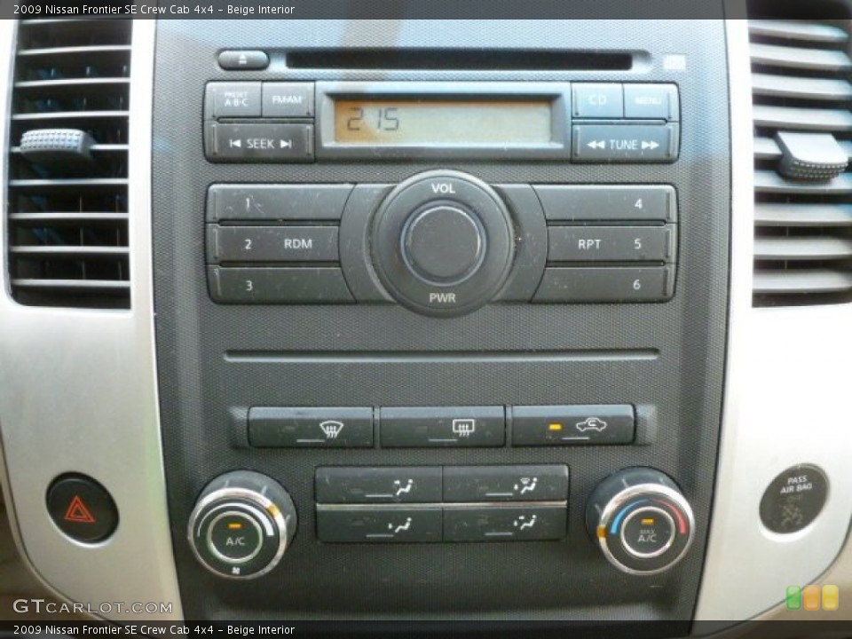 Beige Interior Controls for the 2009 Nissan Frontier SE Crew Cab 4x4 #66401633