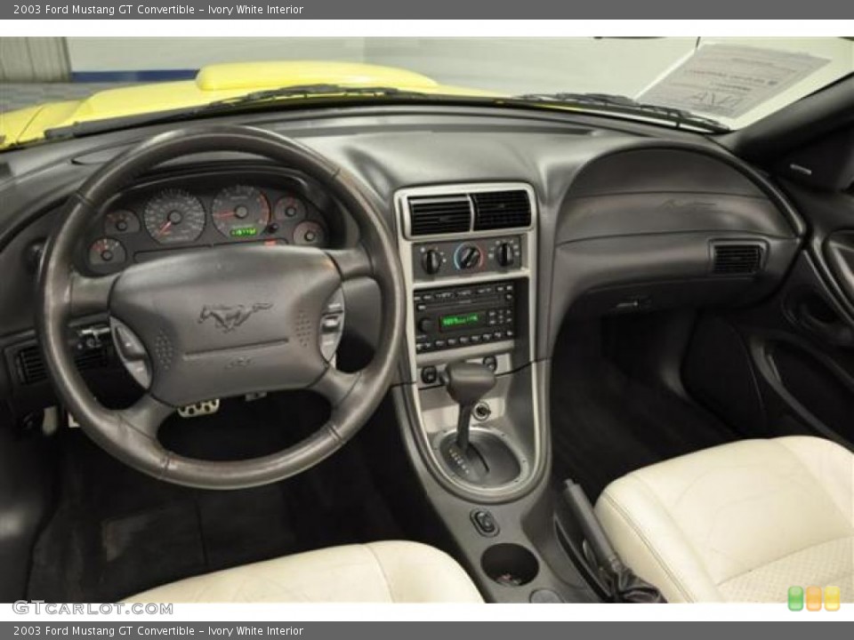 Ivory White Interior Dashboard for the 2003 Ford Mustang GT Convertible #66415390