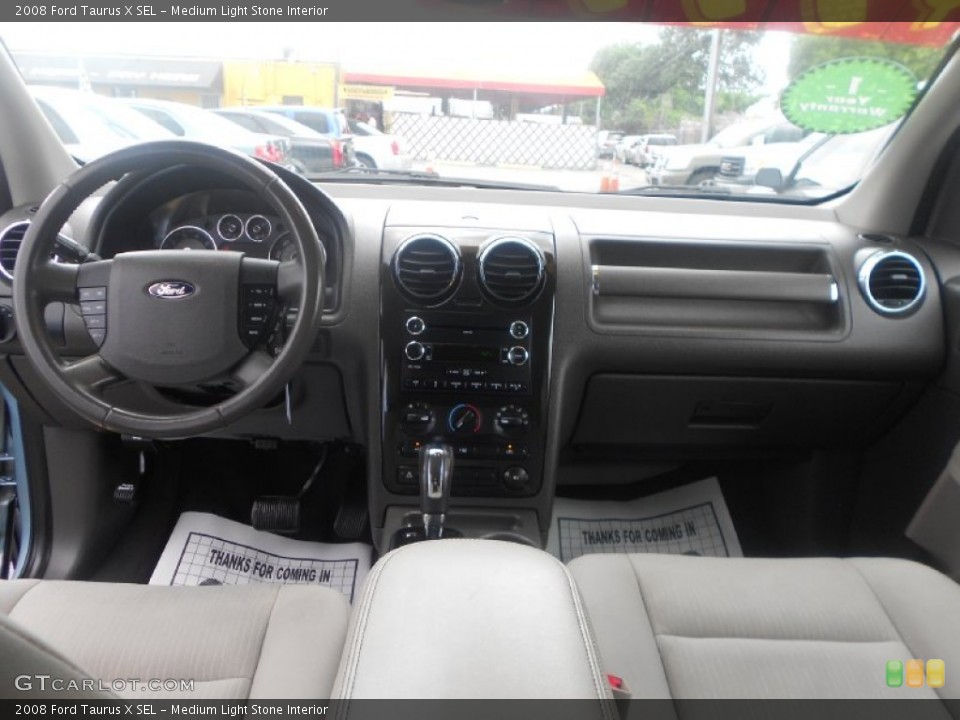 Medium Light Stone Interior Dashboard for the 2008 Ford Taurus X SEL #66419359