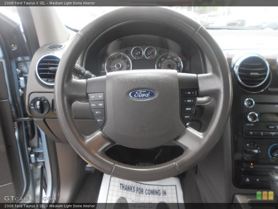 Medium Light Stone Interior Steering Wheel for the 2008 Ford Taurus X SEL #66419371