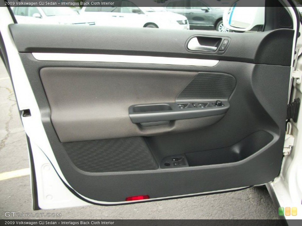 Interlagos Black Cloth Interior Door Panel for the 2009 Volkswagen GLI Sedan #66427117