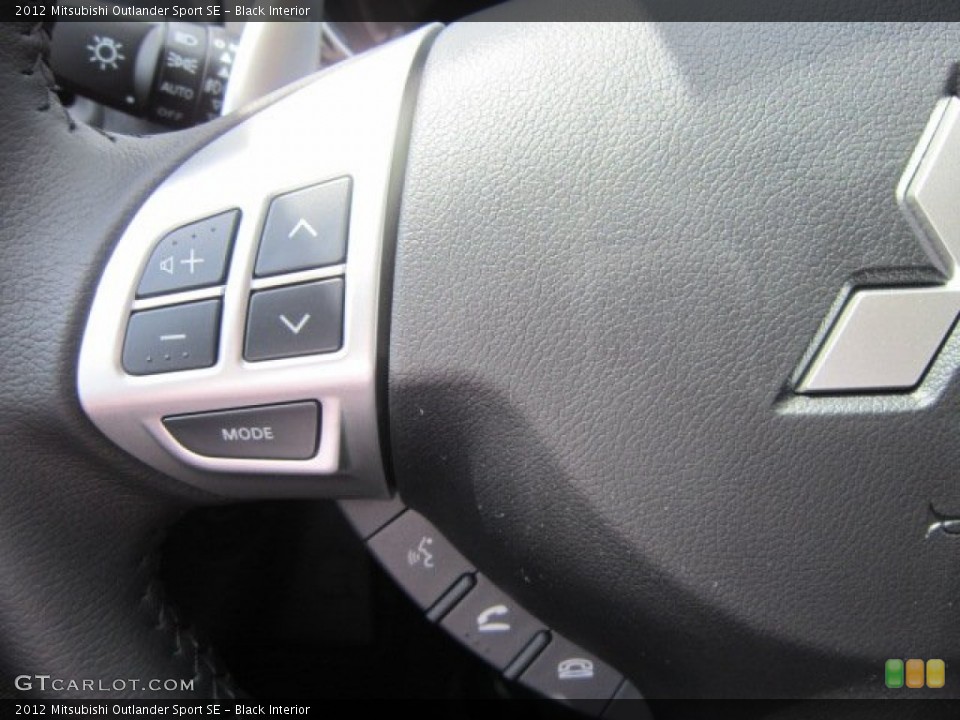 Black Interior Controls for the 2012 Mitsubishi Outlander Sport SE #66444621