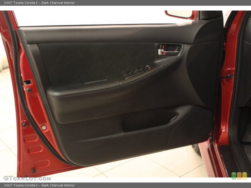 Dark Charcoal Interior Door Panel for the 2007 Toyota Corolla S #66472344