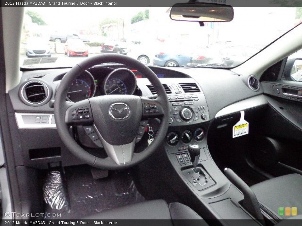 Black Interior Dashboard for the 2012 Mazda MAZDA3 i Grand Touring 5 Door #66503700