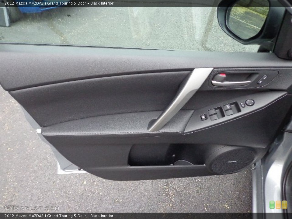 Black Interior Door Panel for the 2012 Mazda MAZDA3 i Grand Touring 5 Door #66503718