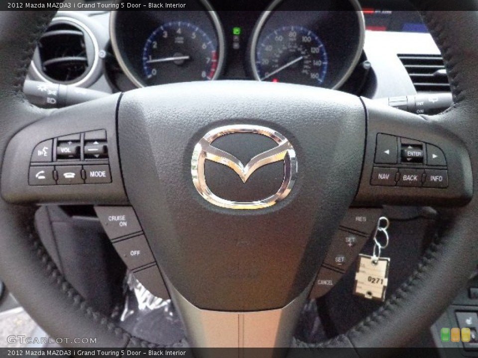 Black Interior Steering Wheel for the 2012 Mazda MAZDA3 i Grand Touring 5 Door #66503746