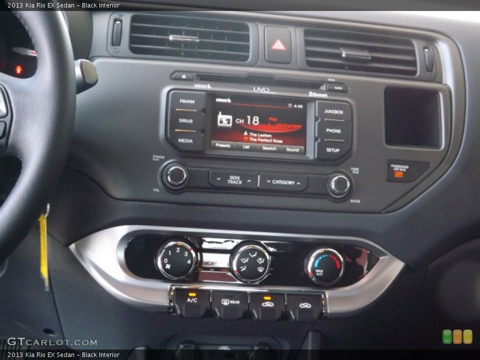 Black Interior Controls for the 2013 Kia Rio EX Sedan #66519063
