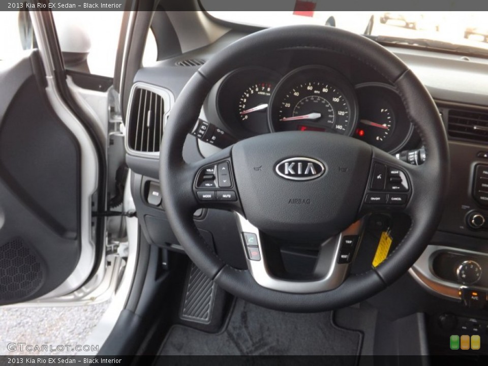 Black Interior Steering Wheel for the 2013 Kia Rio EX Sedan #66519069