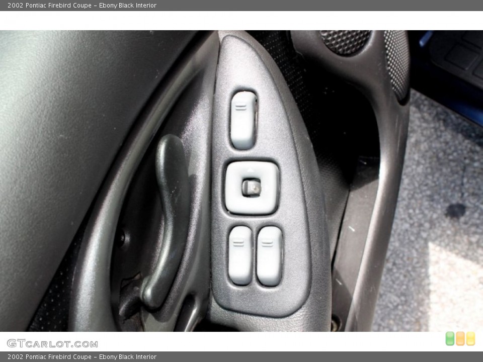 Ebony Black Interior Controls for the 2002 Pontiac Firebird Coupe #66532821