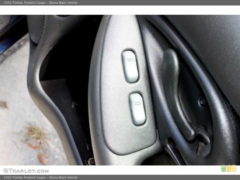 Ebony Black Interior Controls for the 2002 Pontiac Firebird Coupe #66532831