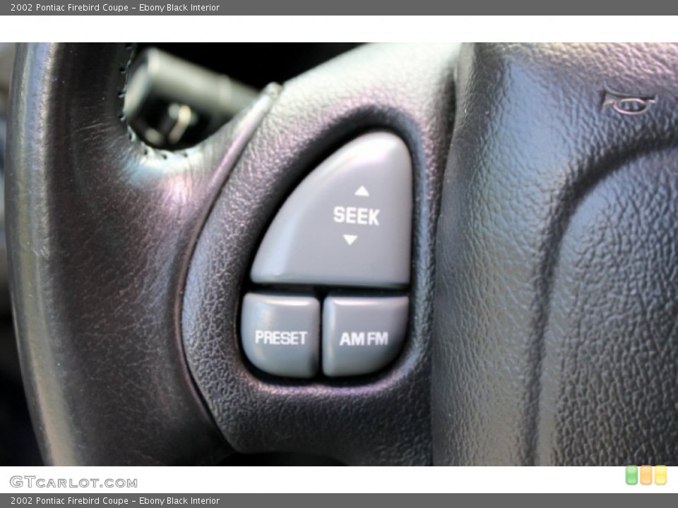 Ebony Black Interior Controls for the 2002 Pontiac Firebird Coupe #66532998
