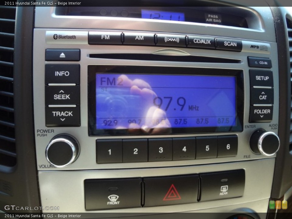 Beige Interior Audio System for the 2011 Hyundai Santa Fe GLS #66538929