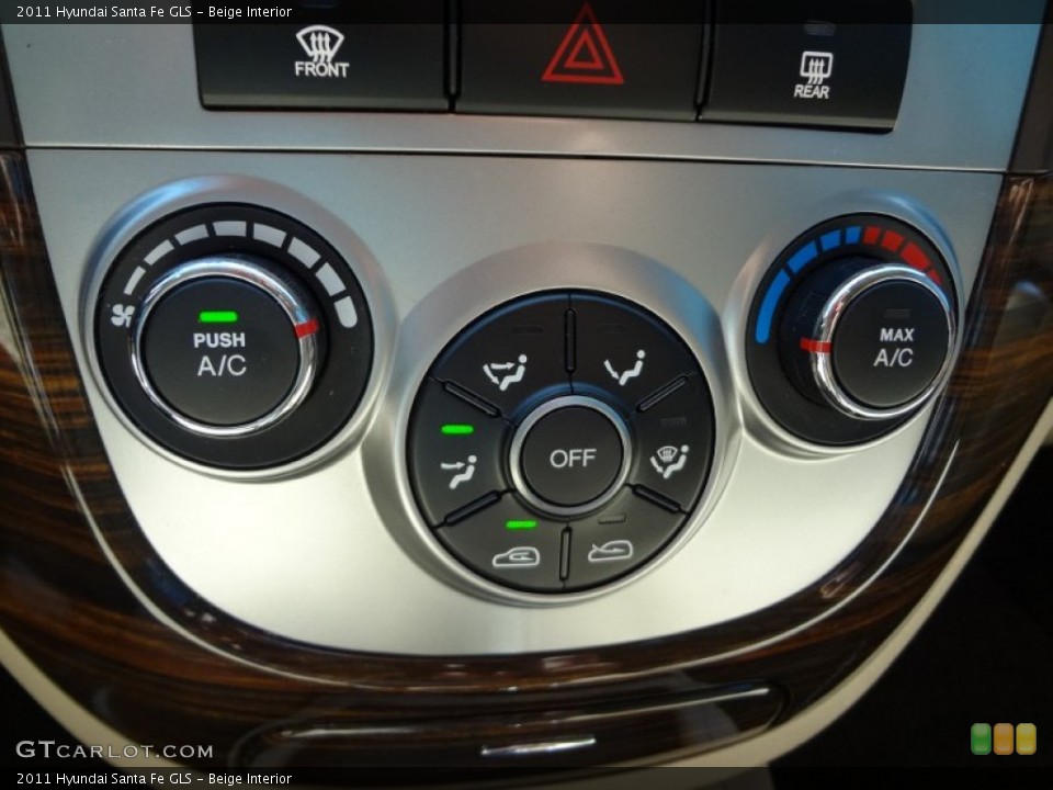 Beige Interior Controls for the 2011 Hyundai Santa Fe GLS #66538938