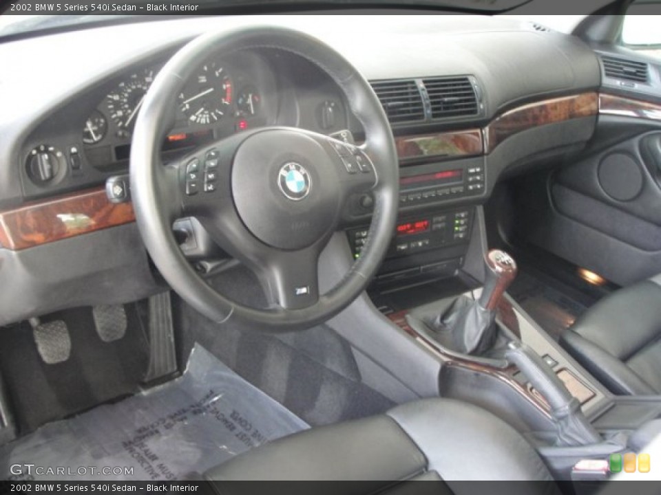 Black Interior Dashboard for the 2002 BMW 5 Series 540i Sedan #66557538