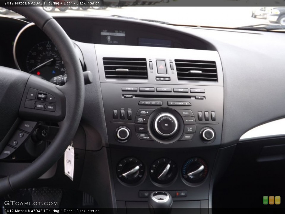 Black Interior Controls for the 2012 Mazda MAZDA3 i Touring 4 Door #66613730
