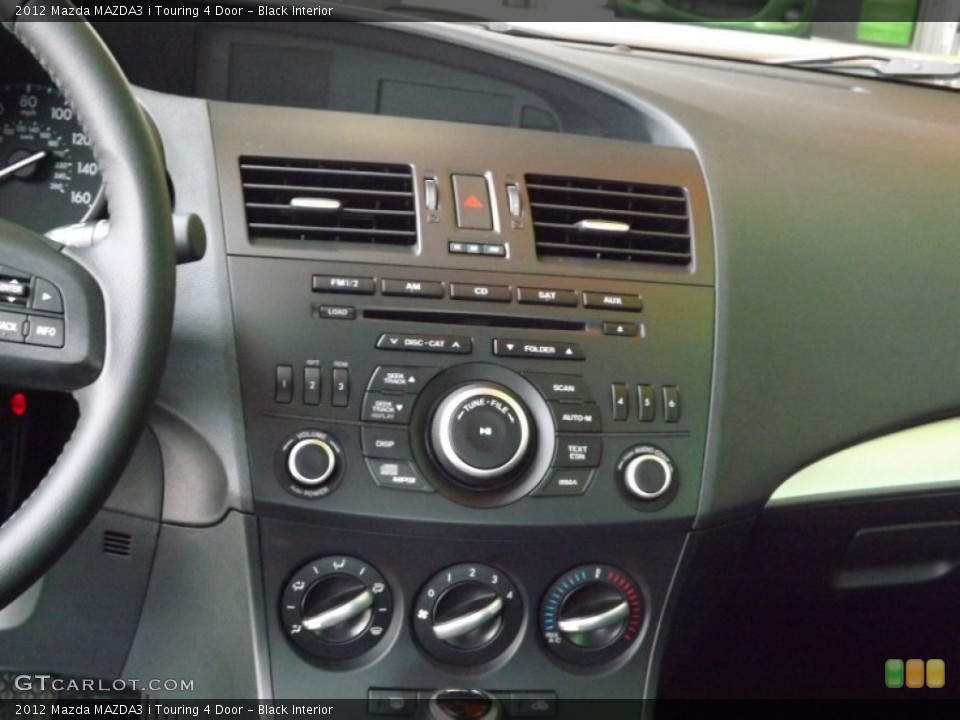 Black Interior Controls for the 2012 Mazda MAZDA3 i Touring 4 Door #66613772