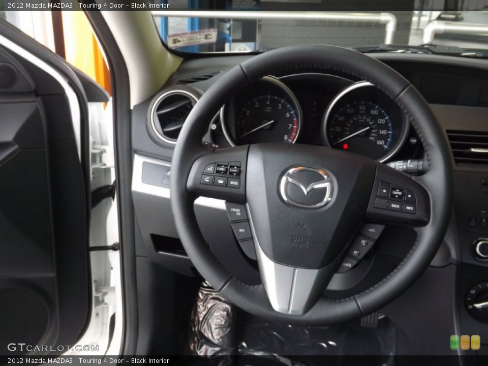 Black Interior Steering Wheel for the 2012 Mazda MAZDA3 i Touring 4 Door #66613775